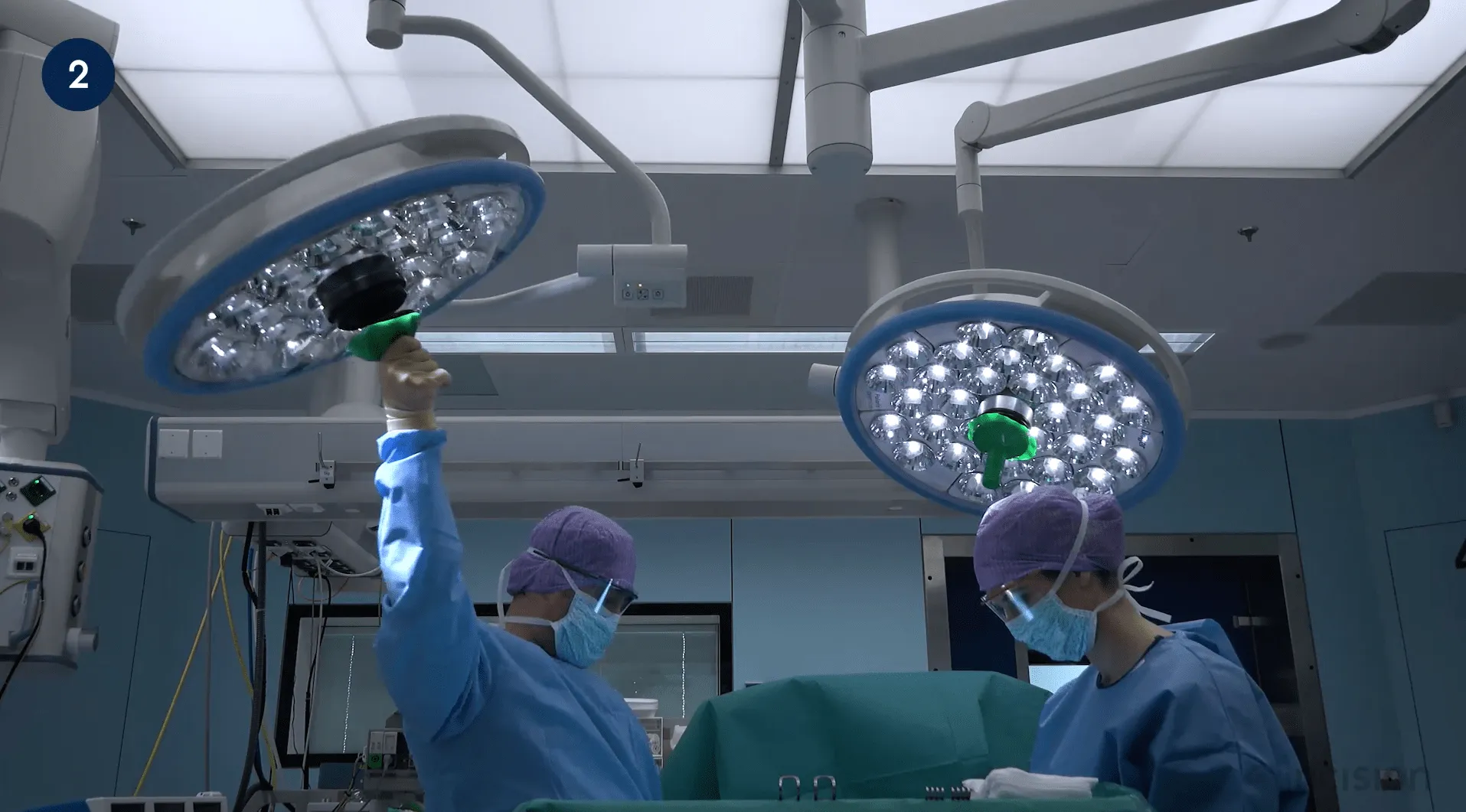 Operating room team member positions the light